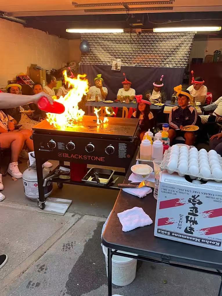 A1 Hibachi fire show with guests watching