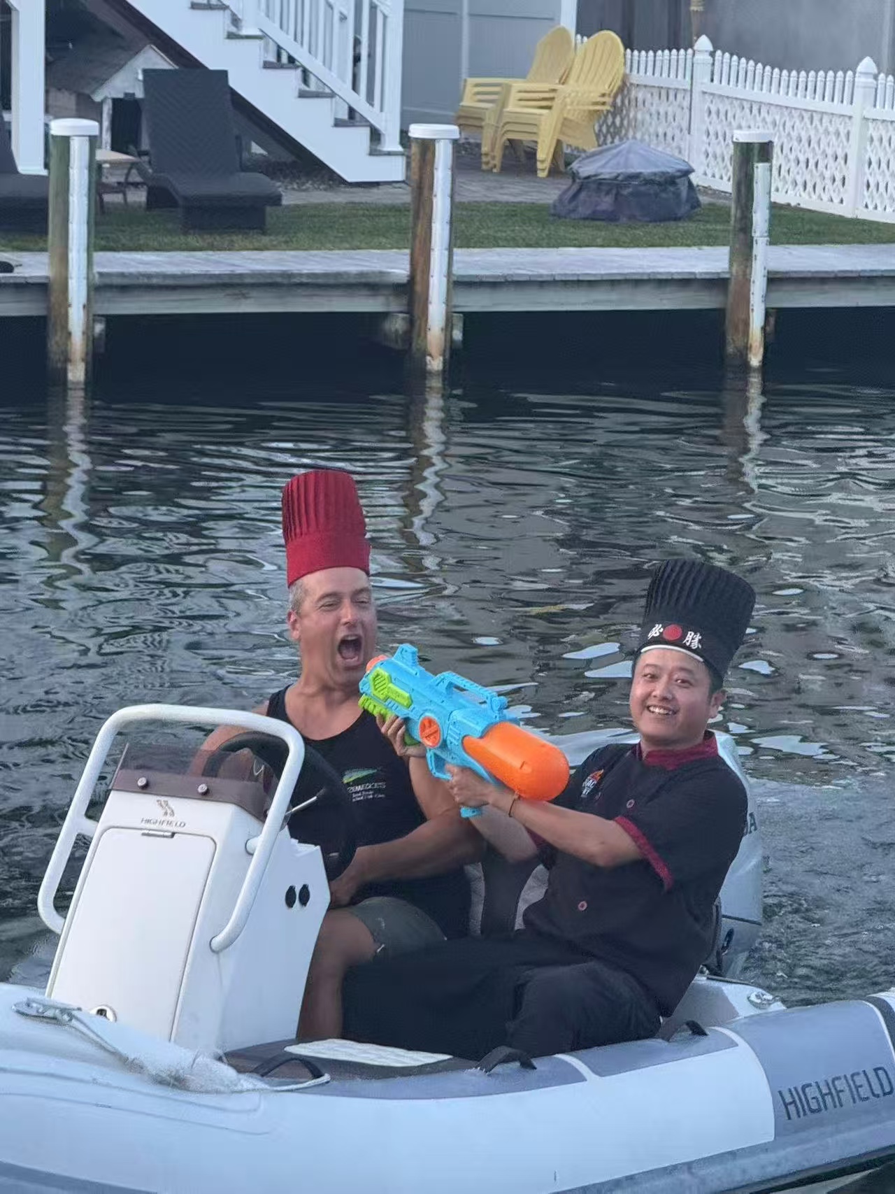 A1 Hibachi fun boat party moment with chef and guest