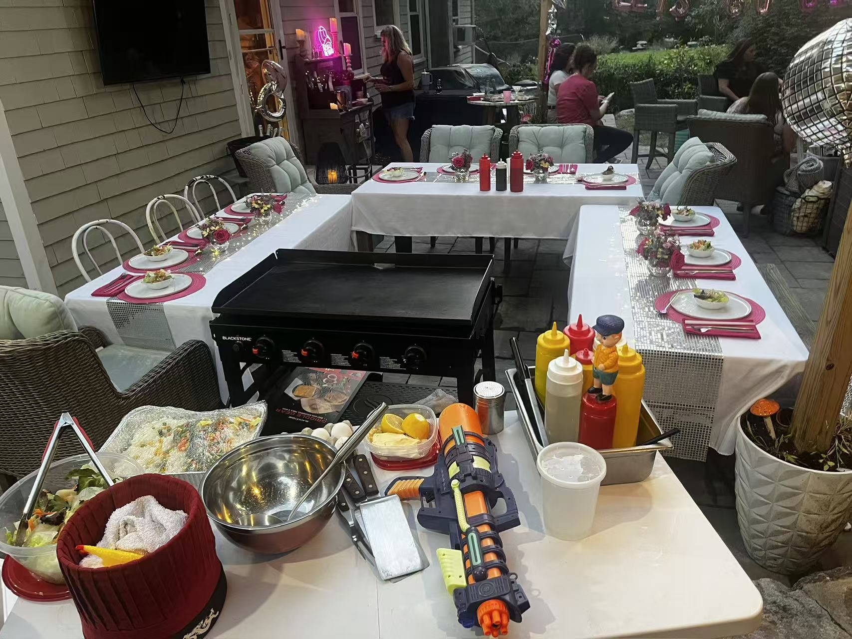 Birthday hibachi party setup with pink theme